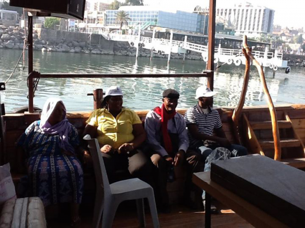 Tourists enjoy a Boat Ride through Galilee